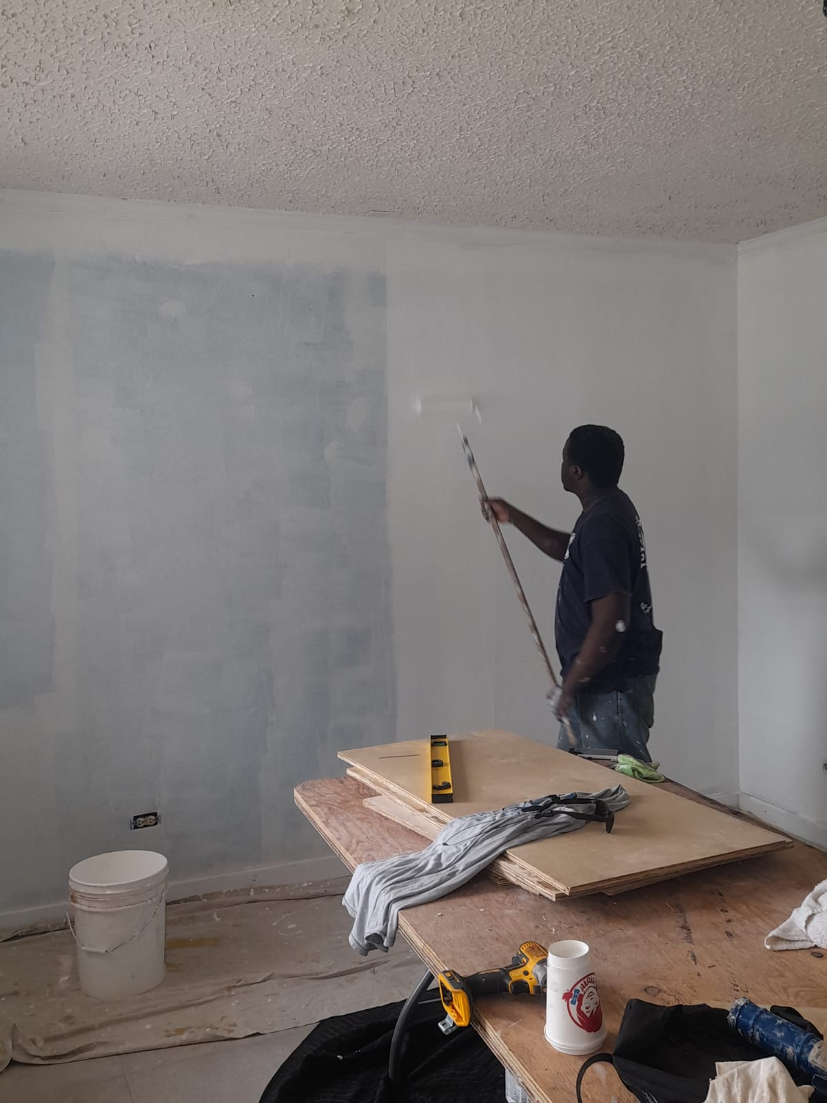 Wall painting in progress Nassau